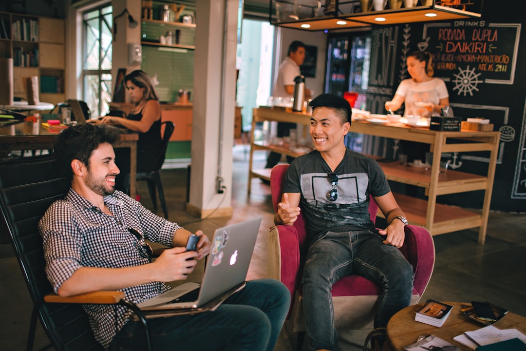 Business professionals connecting in conversation at a networking event